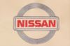 Вышивка логотипа NISSAN, на коже